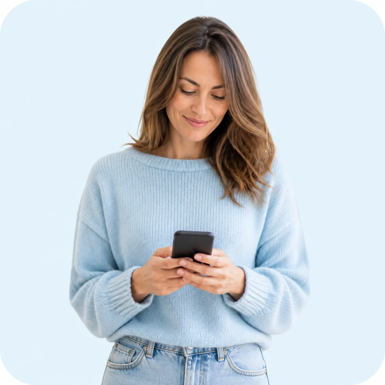 Smiling woman using her phone to explore personal loan options online. The process is safe, fast, and can be done from home.